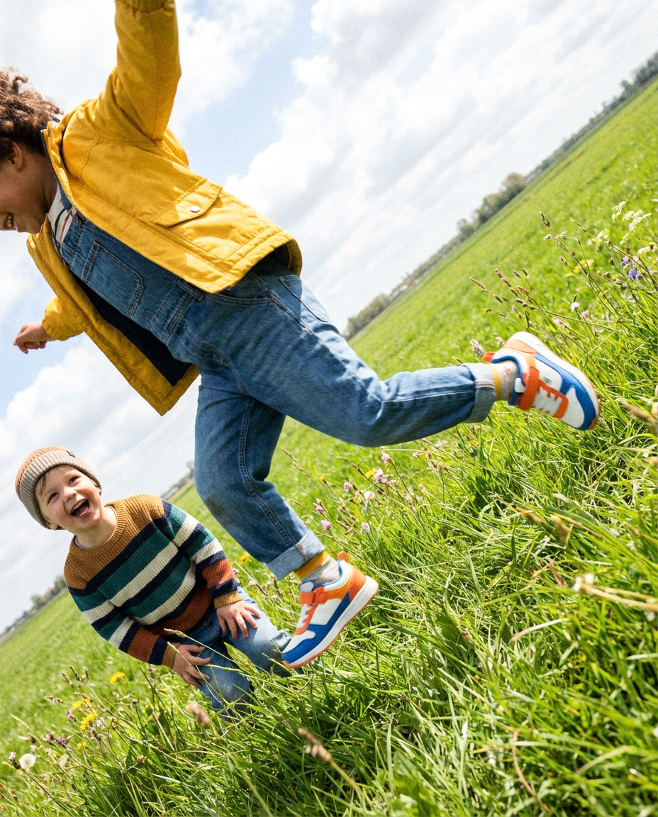 Kid jumping in Grove Footwear sneakers