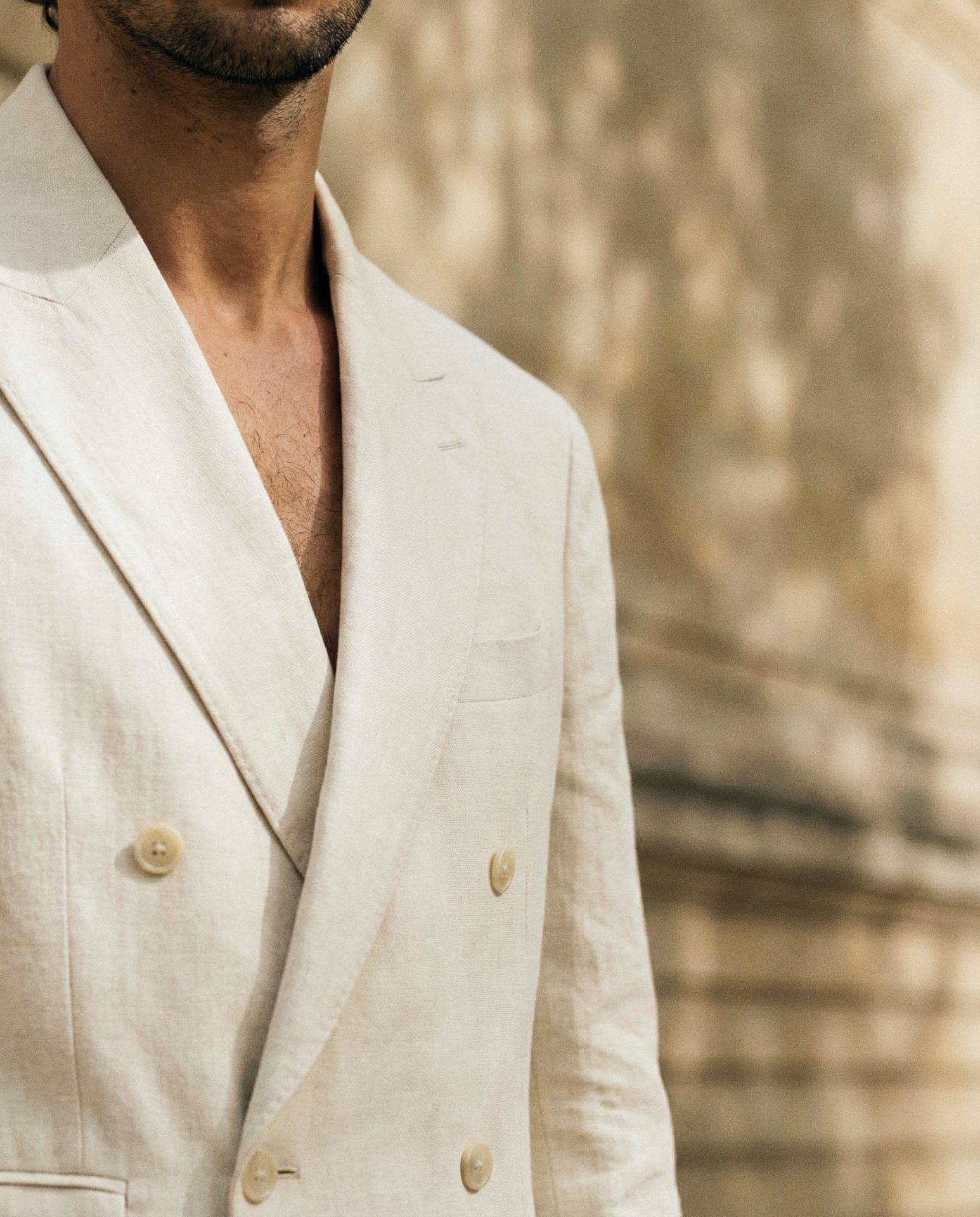 Ivory suit button detail